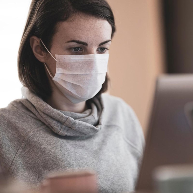 woman wearing a mask