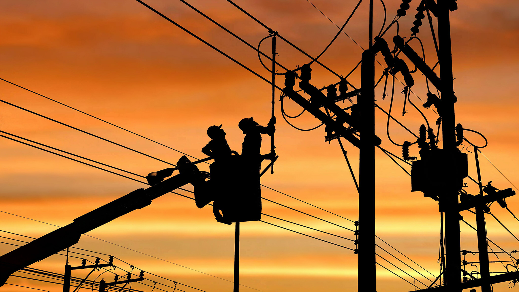 Power line workHow grid-integrated heat pump water heaters can lower costs and demand